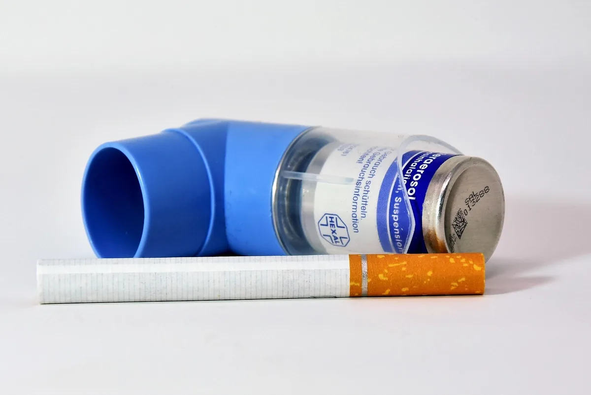 A child using an asthma inhaler