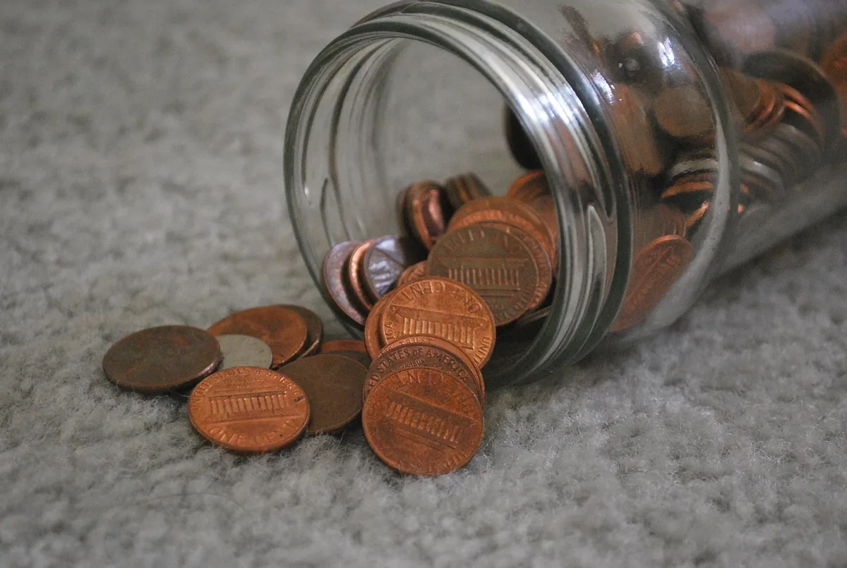 A jar of coins representing money saved