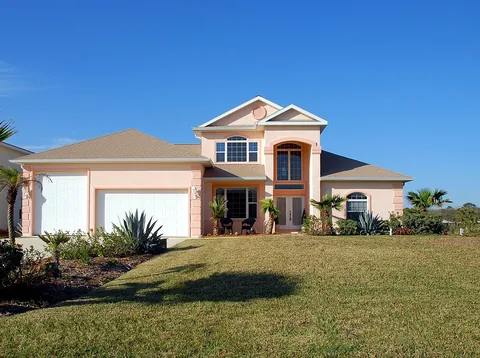A suburban house with a for-sale-style exterior