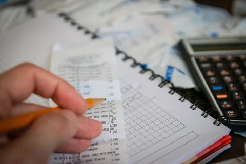 A calculator on a desk for estimating costs