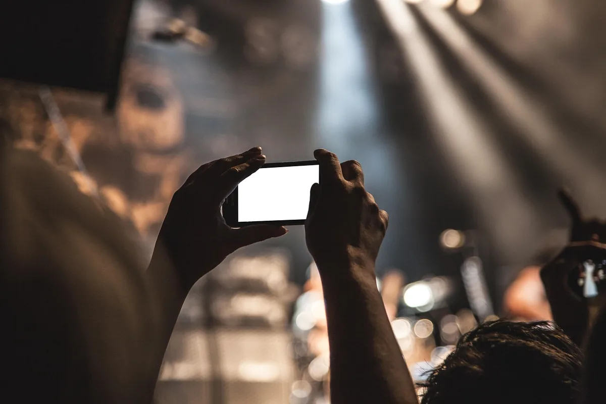 A smartphone recording a video at home