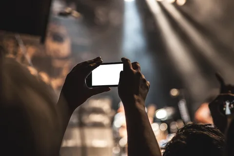 A smartphone recording a video at home