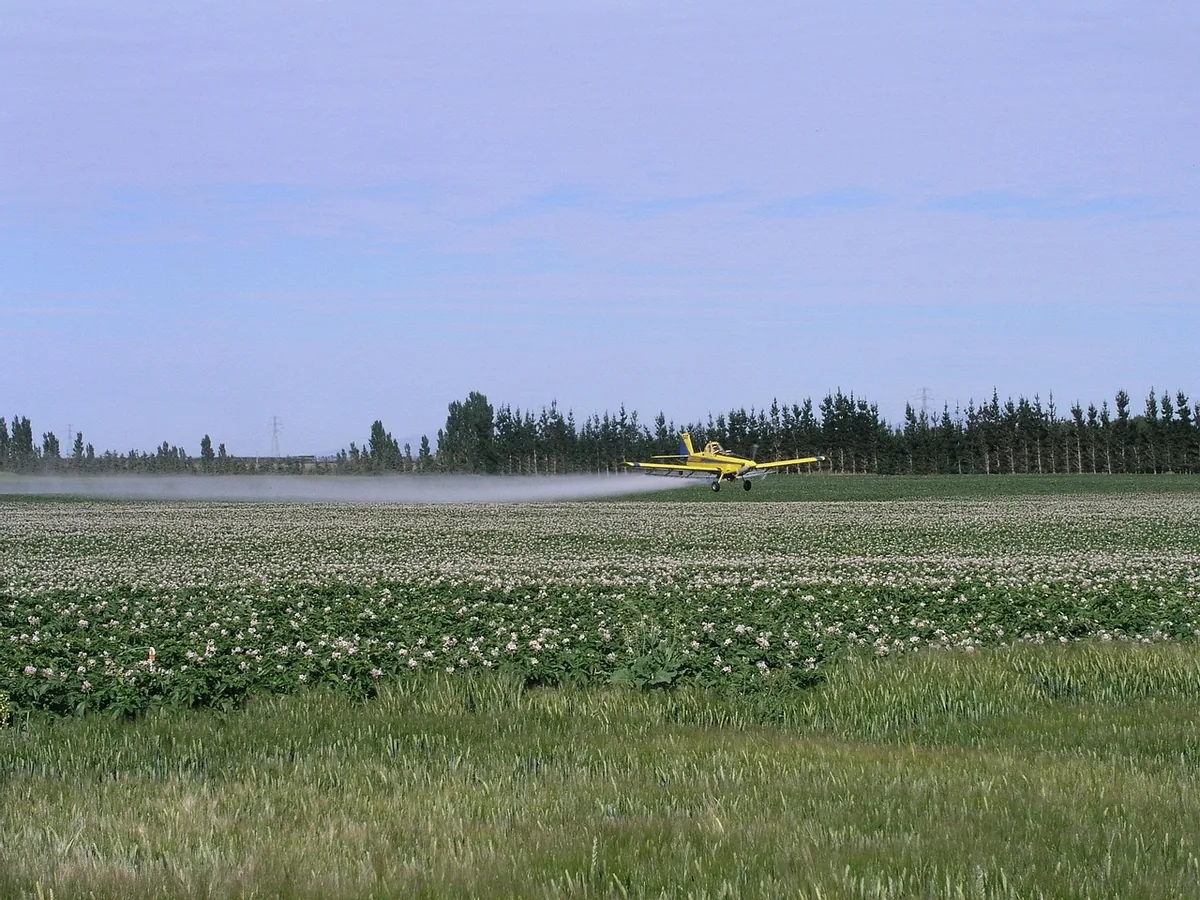 A field being treated, suggesting repeat applications